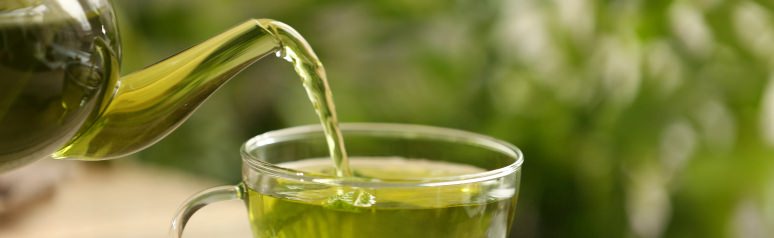 Tea being poured into a cup
