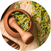 herbs being ground